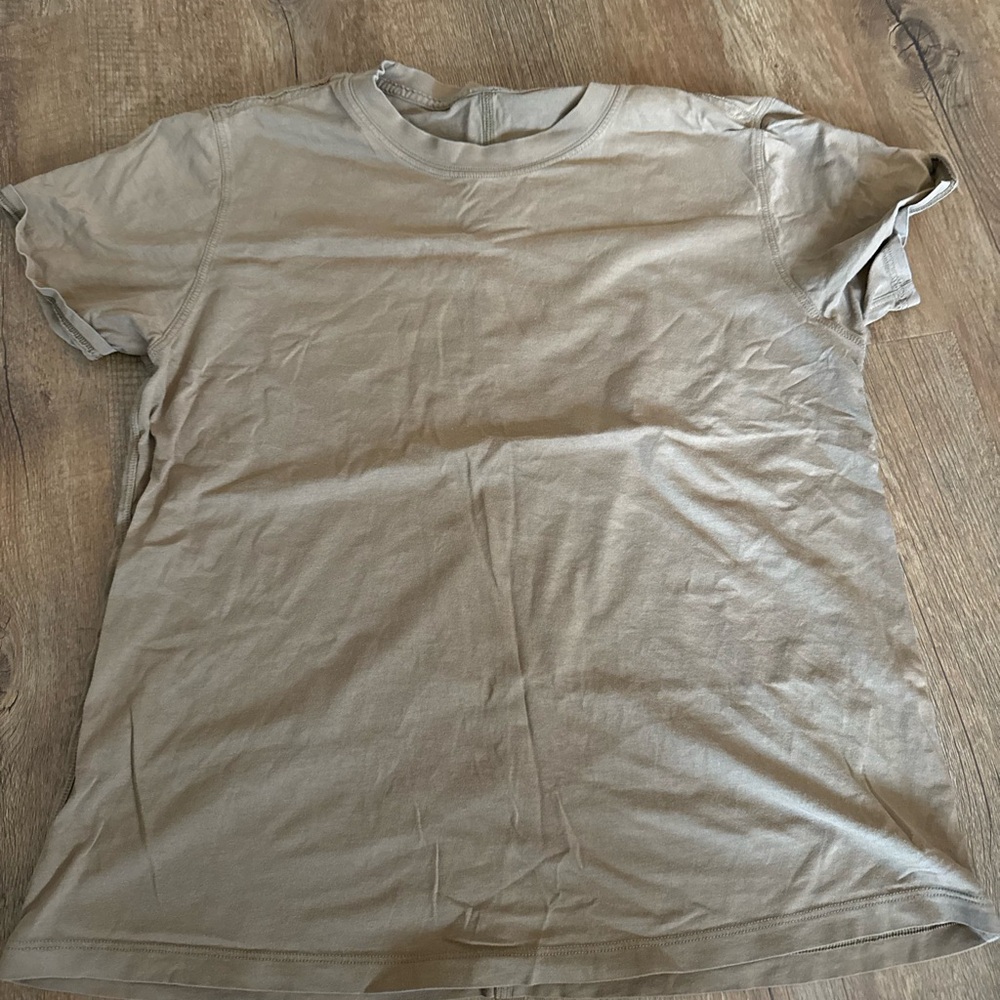 Lululemon tan shirt.